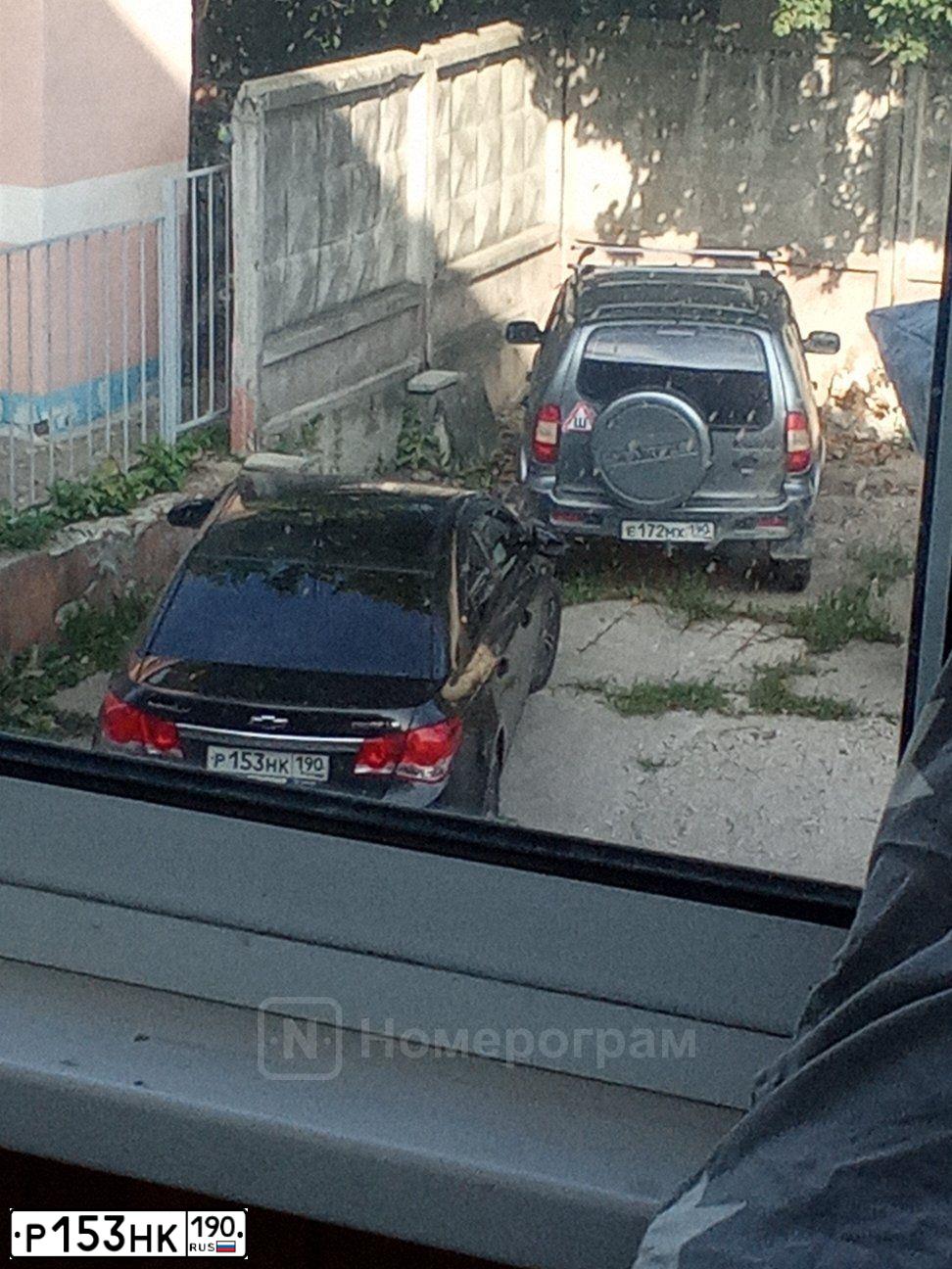 Фото автомобиля CHEVROLET CRUZE, 2011 — госномер Р153НК190. Цвет: ЧЕРНЫЙ