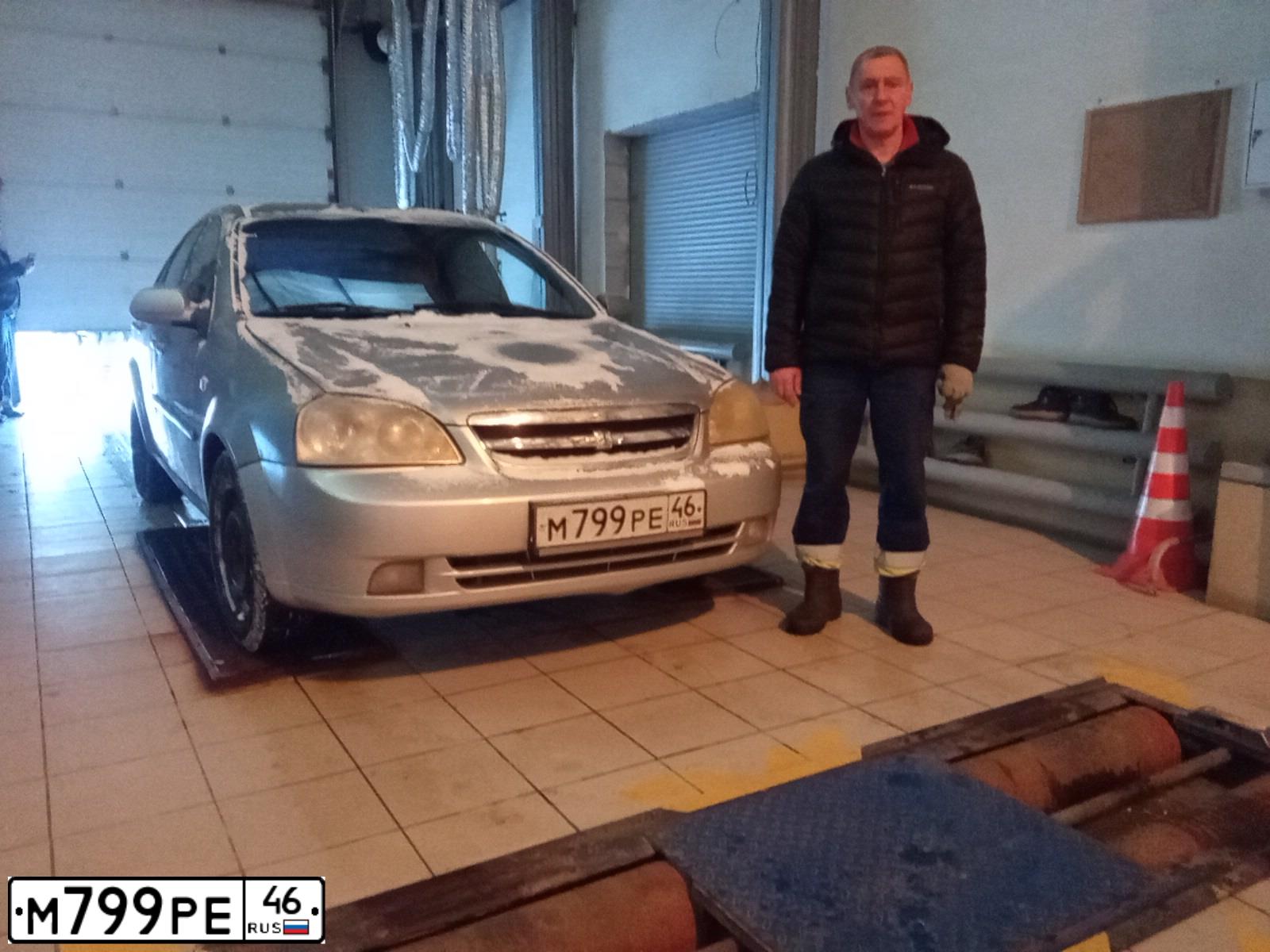Фото автомобиля CHEVROLET LACETTI, 2012 — госномер М322ТК71. Цвет: ЧЕРНЫЙ