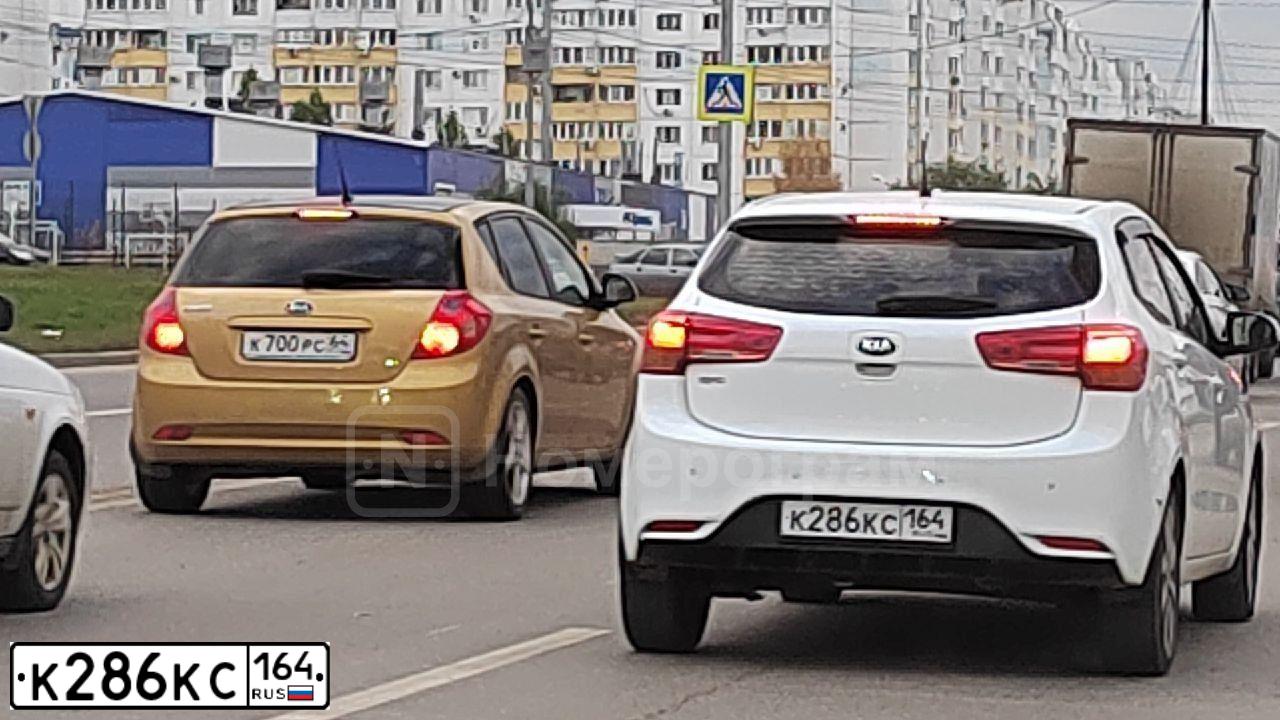 Фото автомобиля KIA RIO, 2015 — госномер К286КС164. Цвет: Белый