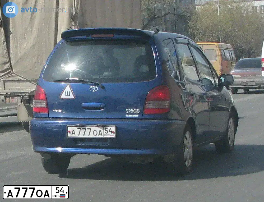 Фото автомобиля HYUNDAI IX35, 2010 — госномер А777ОА54. Цвет: КОРИЧНЕВЫЙ