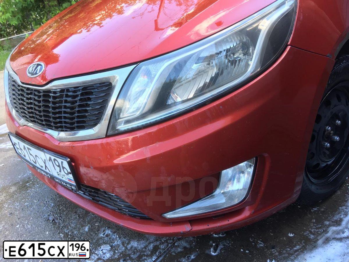 Фото автомобиля KIA RIO, 2011 — госномер Н588ЕН196. Цвет: Красный