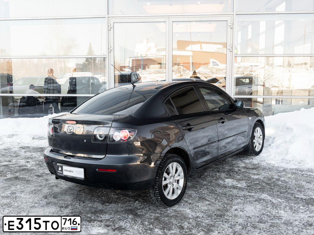 Фото автомобиля MAZDA 3, 2007 — госномер Е315ТО716. Цвет: СЕРЫЙ ТЕМНЫЙ