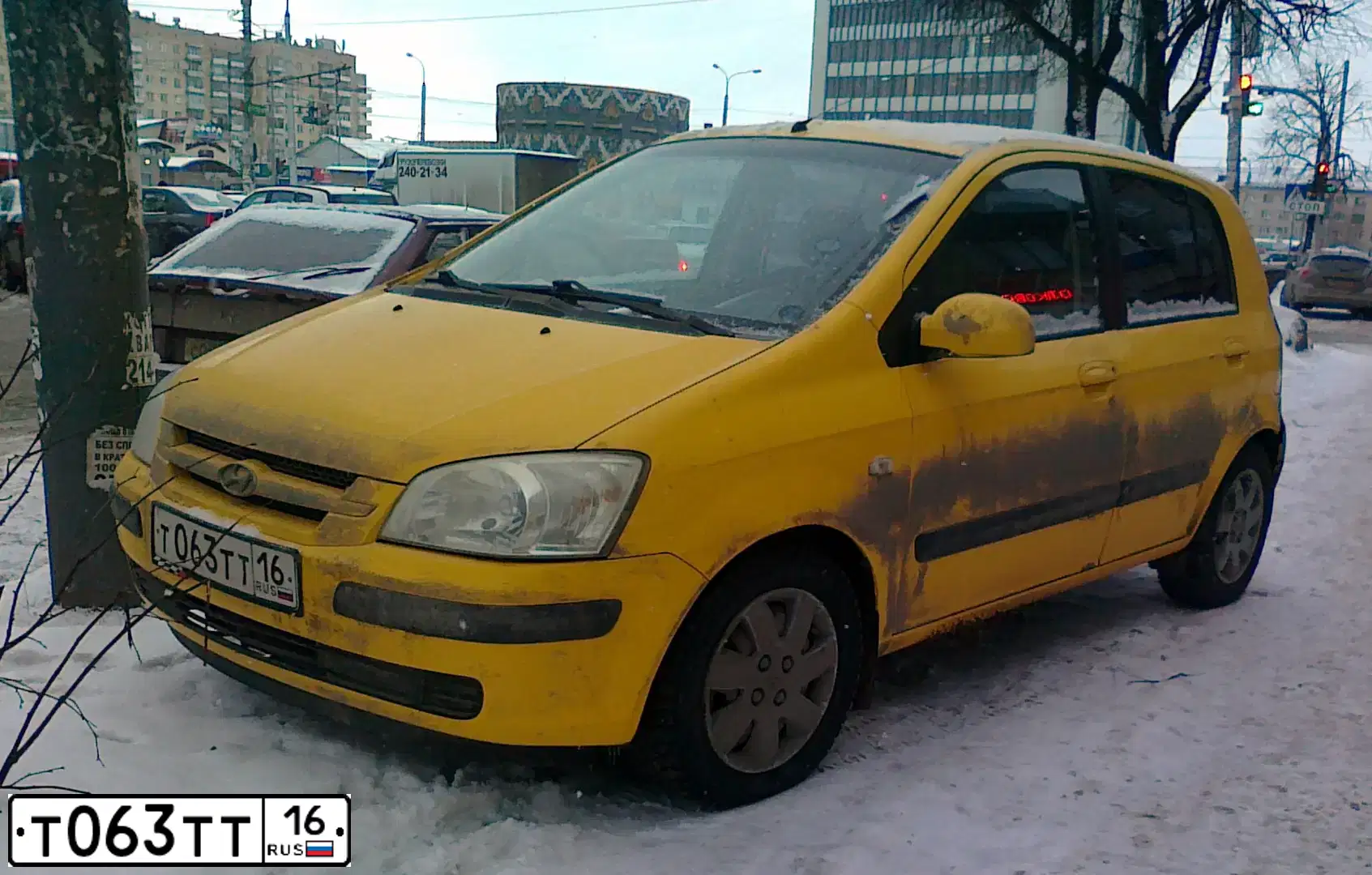 Фото автомобиля HYUNDAI GETZ, 2004 — госномер Т063ТТ16. Цвет: ЯРКО-ЖЕЛТЫЙ