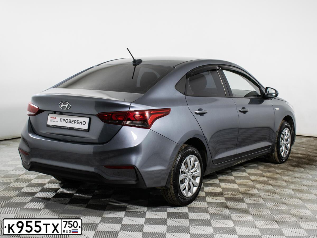 Фото автомобиля HYUNDAI SOLARIS, 2019 — госномер К955ТХ750. Цвет: СЕРЫЙ