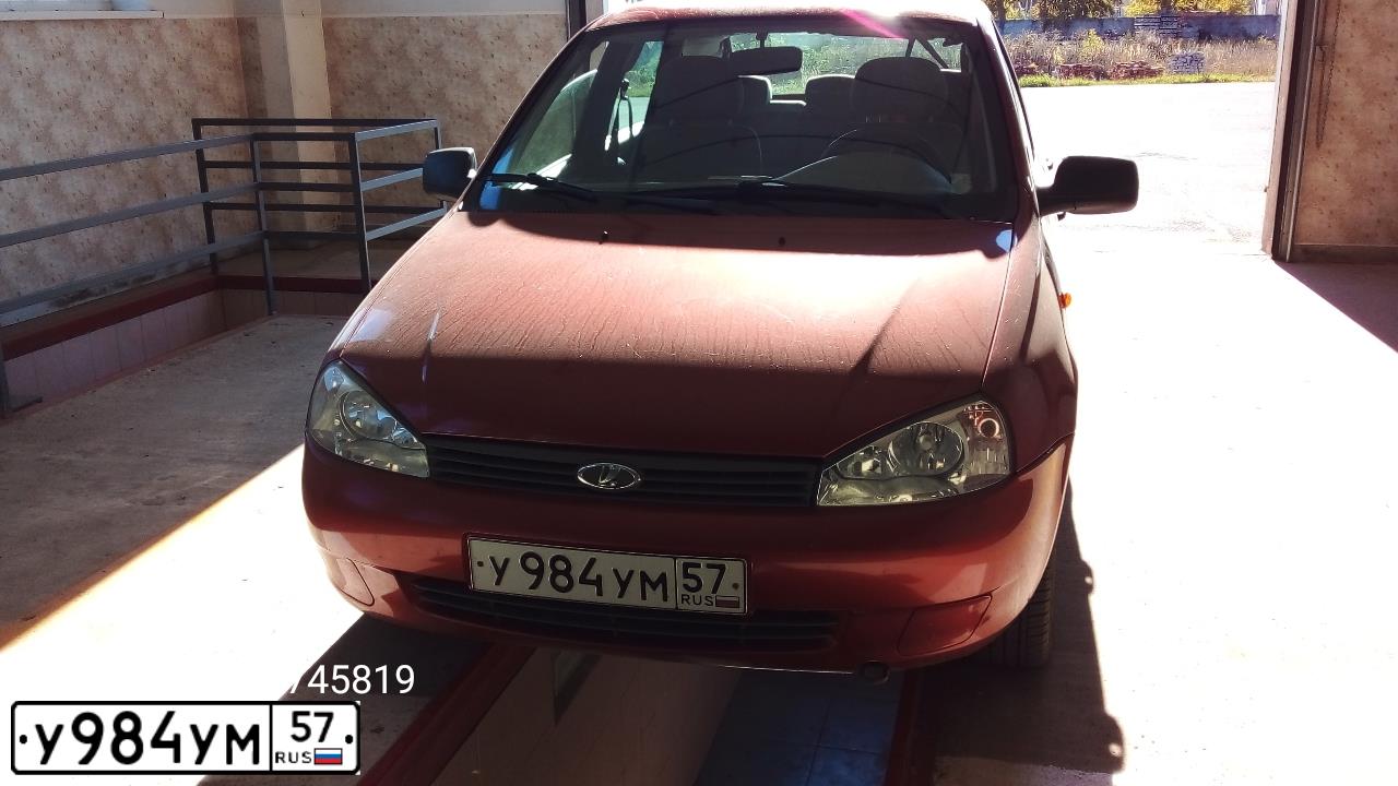 Фото автомобиля LADA 1119 KALINA, 2011 — госномер У984УМ57. Цвет: СЕРЕБРИСТО-КРАСНЫЙ