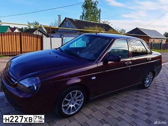 Фото автомобиля LADA 2170 PRIORA, 2011 — госномер А774КЕ774. Цвет: ТЕМНО-ВИШНЕВЫЙ