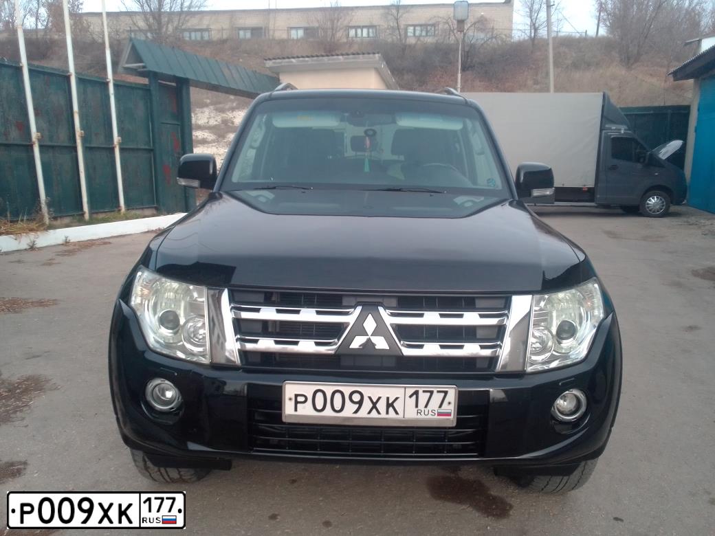 Фото автомобиля MITSUBISHI PAJERO SPORT, 2007 — госномер Р009ХК177. Цвет: ЧЕРНЫЙ