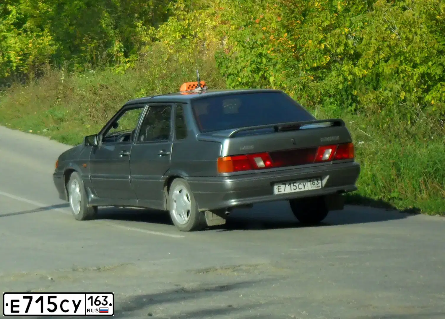 Фото автомобиля LADA 2115 SAMARA, 2007 — госномер Е715СУ163. Цвет: СРЕДНИЙ СЕРО-ЗЕЛЕНЫЙ МЕТАЛЛ