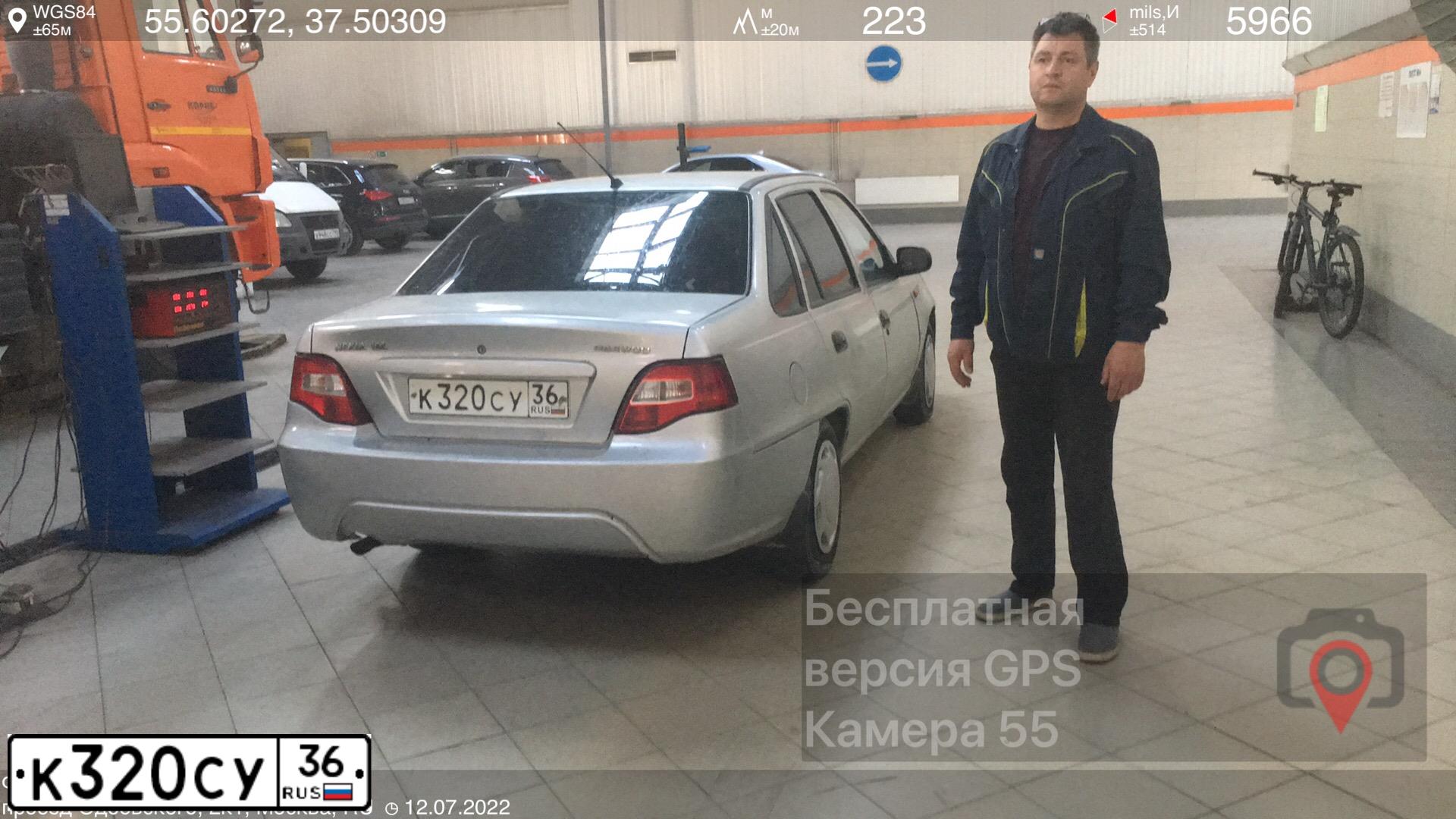 Фото автомобиля DAEWOO NEXIA, 2010 — госномер О078УУ799. Цвет: СЕРЫЙ