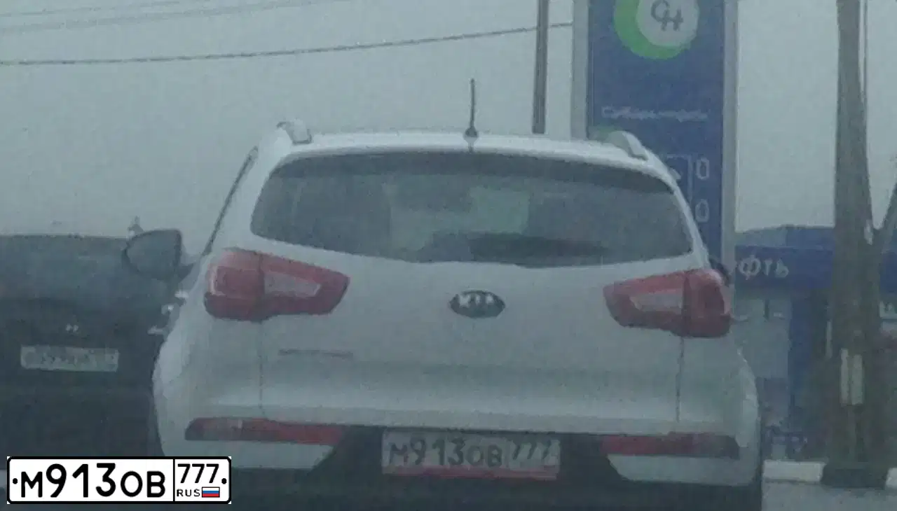 Фото автомобиля KIA SPORTAGE, 2013 — госномер Е976ТР69. Цвет: Белый