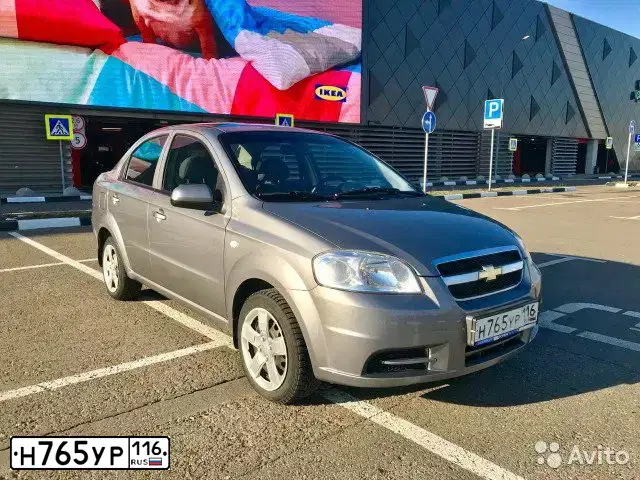 Фото автомобиля CHEVROLET AVEO, 2011 — госномер К902ТВ716. Цвет: СЕРЫЙ