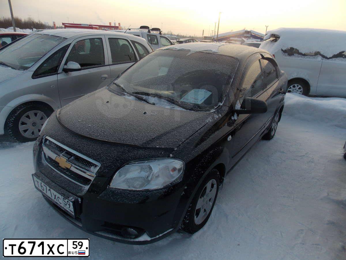 Фото автомобиля CHEVROLET AVEO, 2010 — госномер Т671ХС59. Цвет: ЧЕРНЫЙ