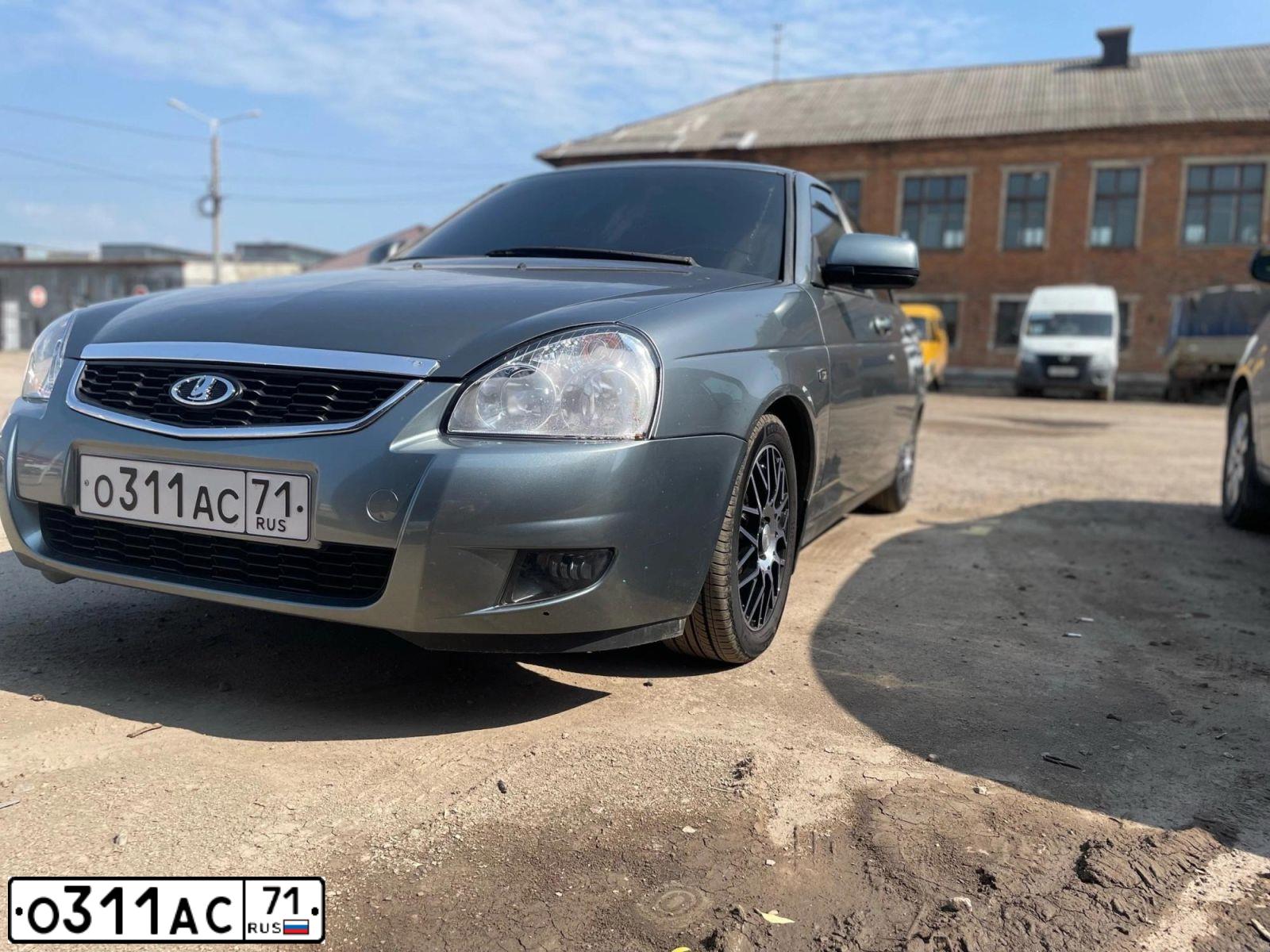 Фото автомобиля LADA 2172 PRIORA, 2010 — госномер О311АС71. Цвет: средний серо-зеленый металлик