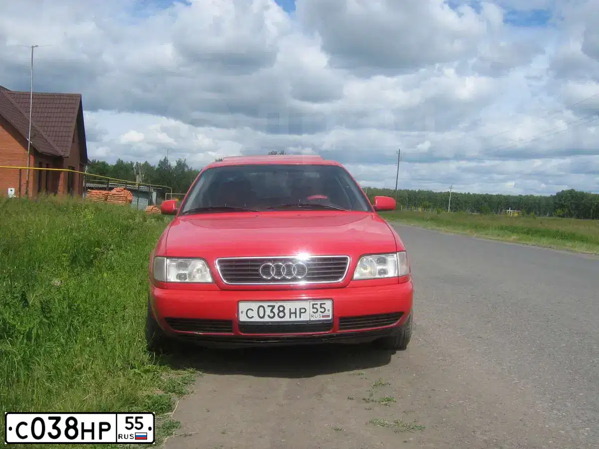 Фото автомобиля AUDI A6, 1996 — госномер Н974ХС64. Цвет: КРАСНЫЙ