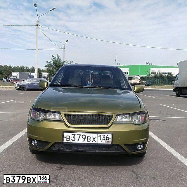 Фото автомобиля DAEWOO NEXIA, 2009 — госномер В379ВХ136. Цвет: ПЕСОЧНЫЙ