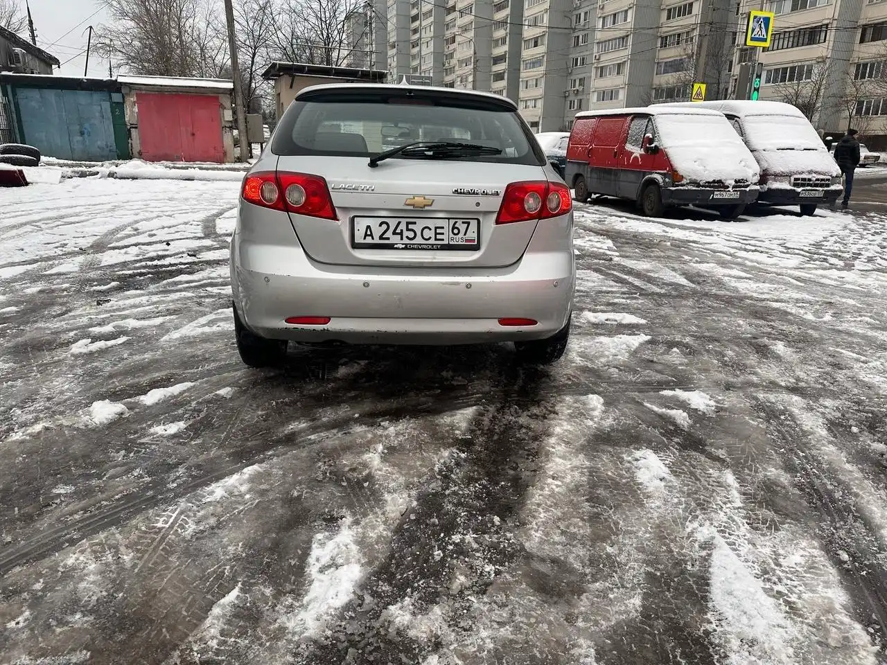 Фото автомобиля CHEVROLET LACETTI, 2010 — госномер М245ЕР197. Цвет: Серебристый