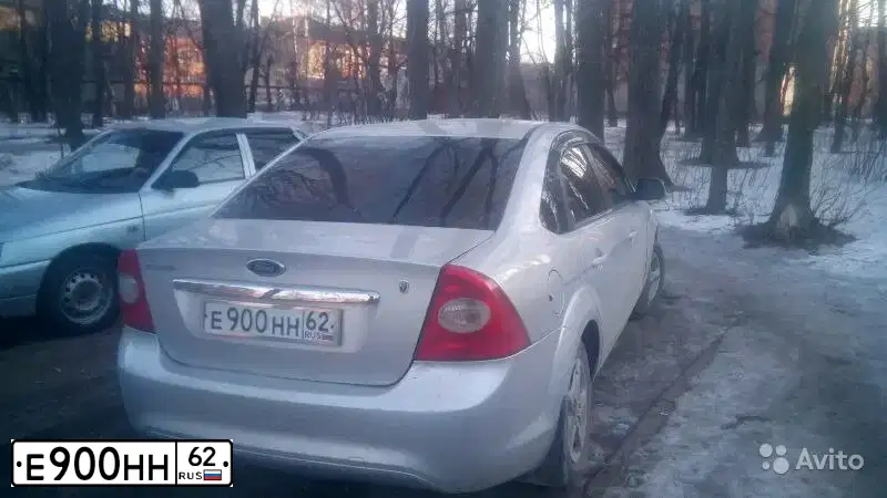 Фото автомобиля FORD FOCUS, 2008 — госномер Е900НН62. Цвет: СЕРЕБРИСТЫЙ