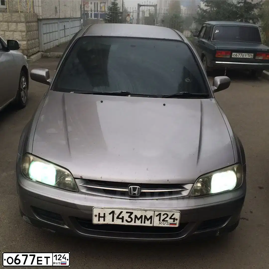 Фото автомобиля LADA 2107, 2005 — госномер О677ЕТ124. Цвет: СИНЕ-ЗЕЛЕНЫЙ