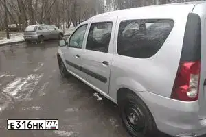 Фото автомобиля LADA LARGUS, 2015 — госномер Е316НК777. Цвет: Серый