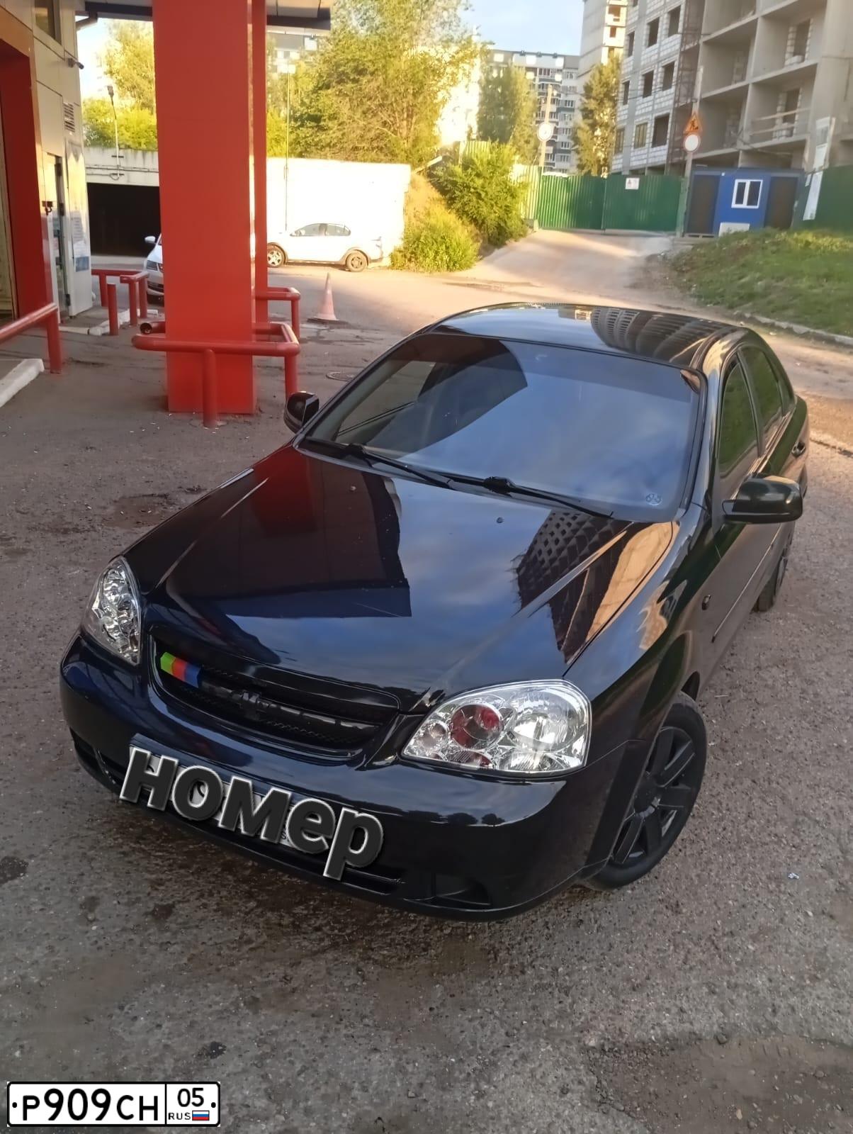 Фото автомобиля LADA 2170 PRIORA, 2008 — госномер Р909СН05. Цвет: Сине-Черный