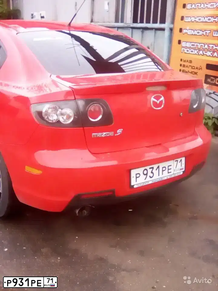 Фото автомобиля MAZDA 3, 2006 — госномер М496РУ702. Цвет: Красный