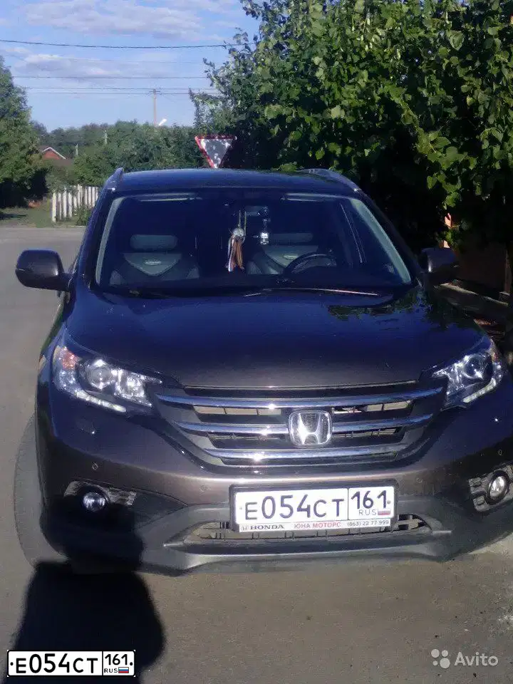 Фото автомобиля HONDA CR-V, 2013 — госномер О423ТТ161. Цвет: СЕРО-КОРИЧНЕВЫЙ