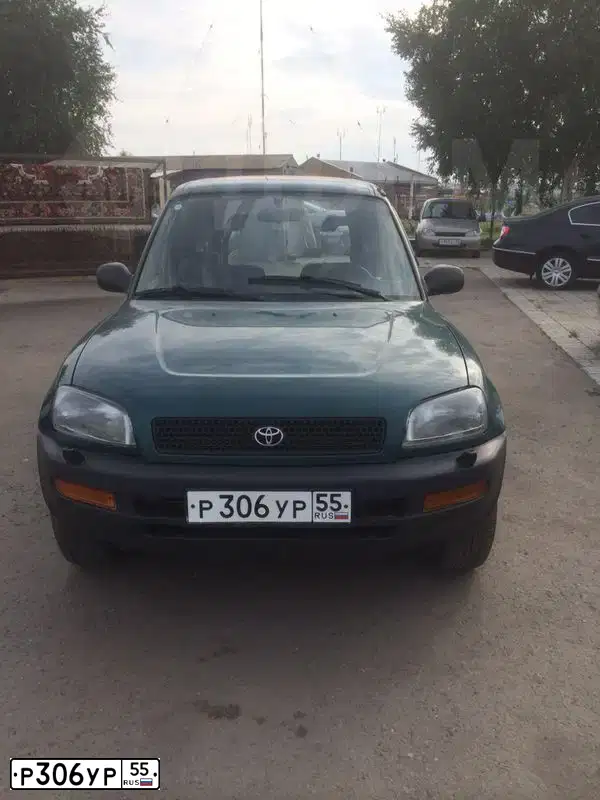 Фото автомобиля TOYOTA RAV4, 1997 — госномер Р306УР55. Цвет: Темно-зеленый