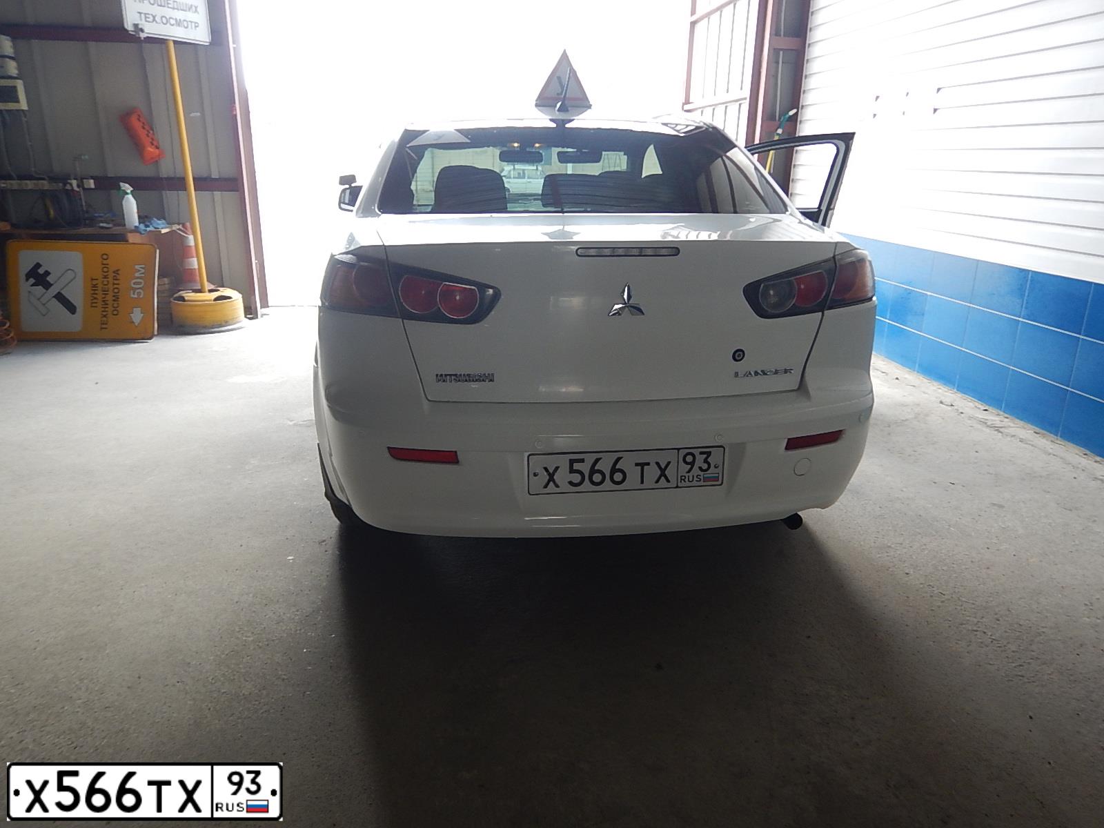 Фото автомобиля MITSUBISHI LANCER, 2010 — госномер Х566ТХ93. Цвет: БЕЛЫЙ