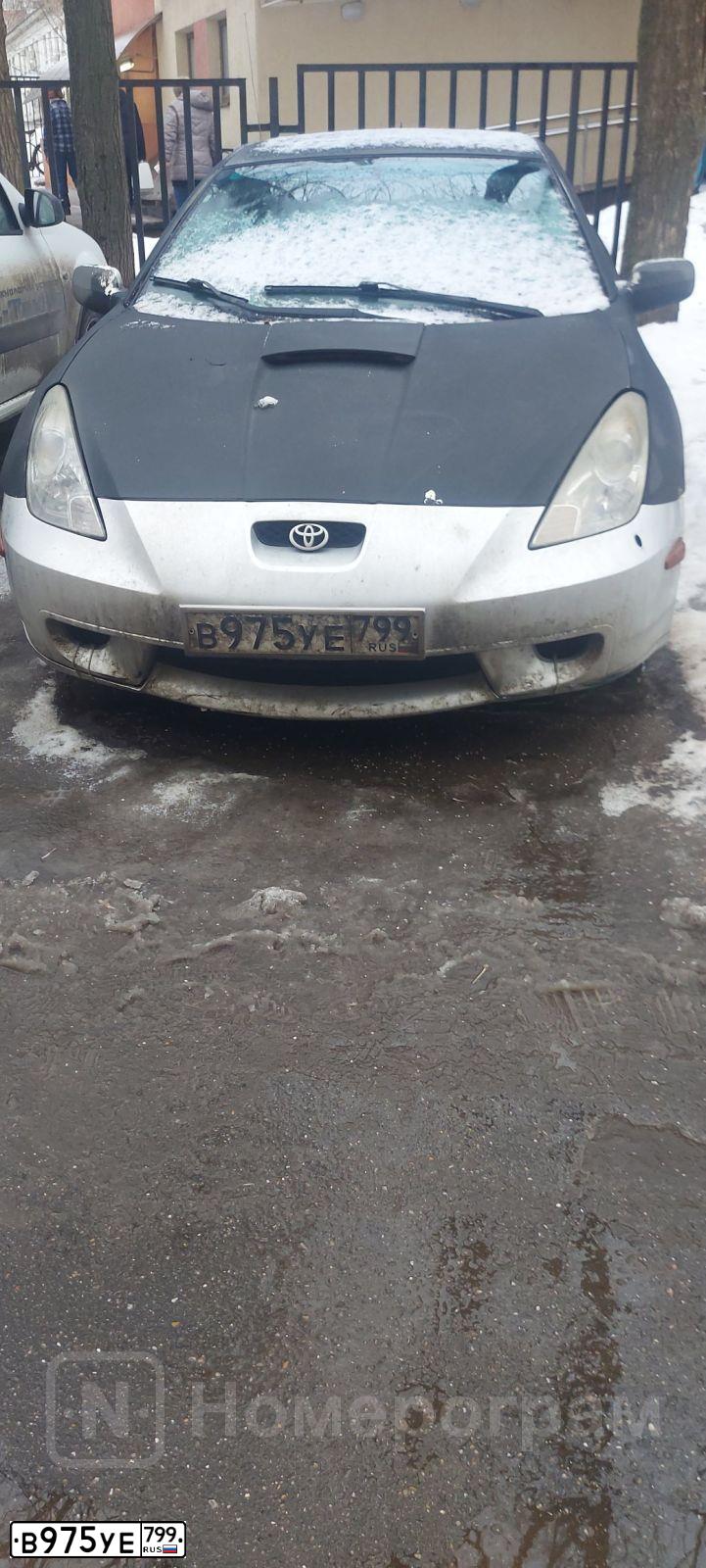 Фото автомобиля TOYOTA CELICA, 2001 — госномер В975УЕ799. Цвет: ЧЕРНЫЙ