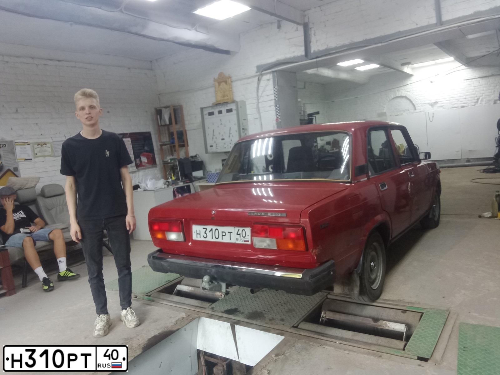Фото автомобиля LADA 2107, 1997 — госномер Н310РТ40. Цвет: ВИШНЕВЫЙ