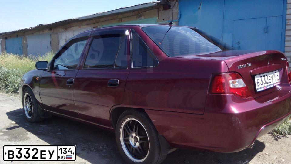 Фото автомобиля DAEWOO NEXIA, 2012 — госномер Р174ТЕ116. Цвет: БОРДОВЫЙ