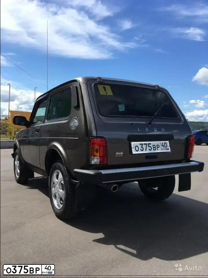 Фото автомобиля LADA 2121 NIVA, 2016 — госномер О375ВР40. Цвет: Золотисто-коричневый