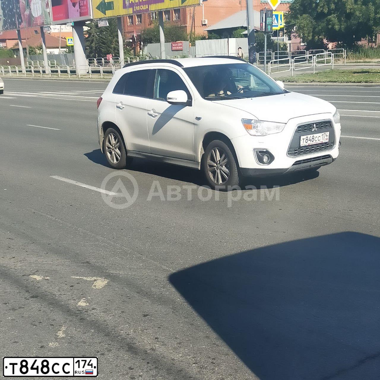 Фото автомобиля MITSUBISHI ASX, 2013 — госномер Н385КР774. Цвет: Белый