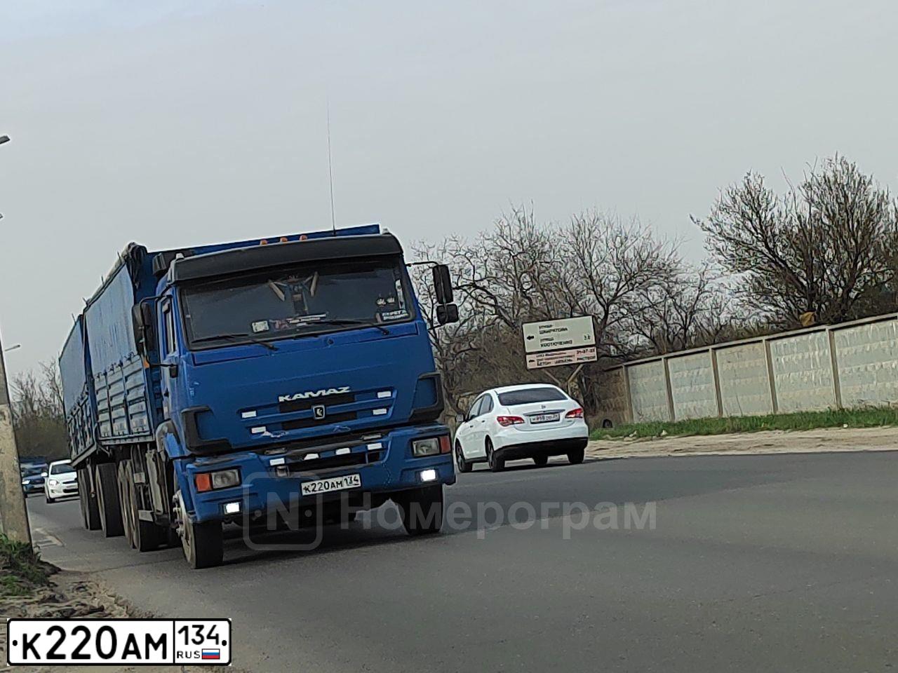 Фото автомобиля KAMAZ 65117 /6X4/, 2011 — госномер К220АМ134. Цвет: синий
