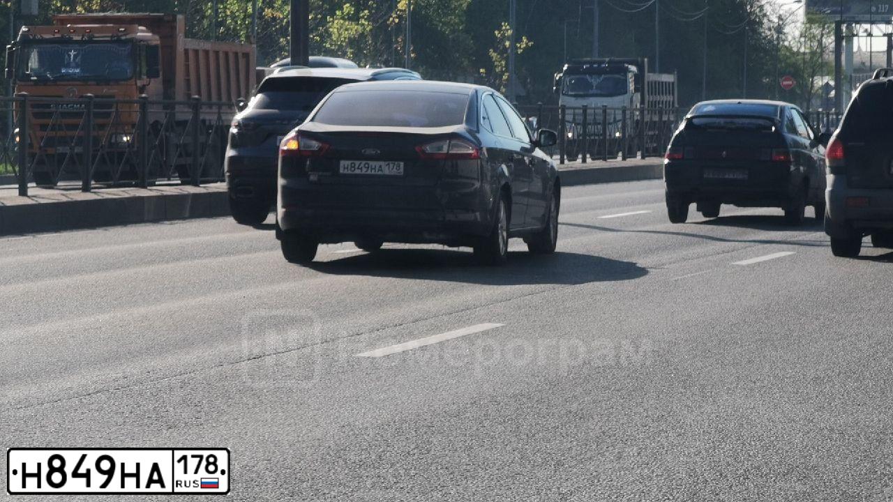 Фото автомобиля FORD MONDEO, 2012 — госномер Е174АТ550. Цвет: ЧЕРНЫЙ