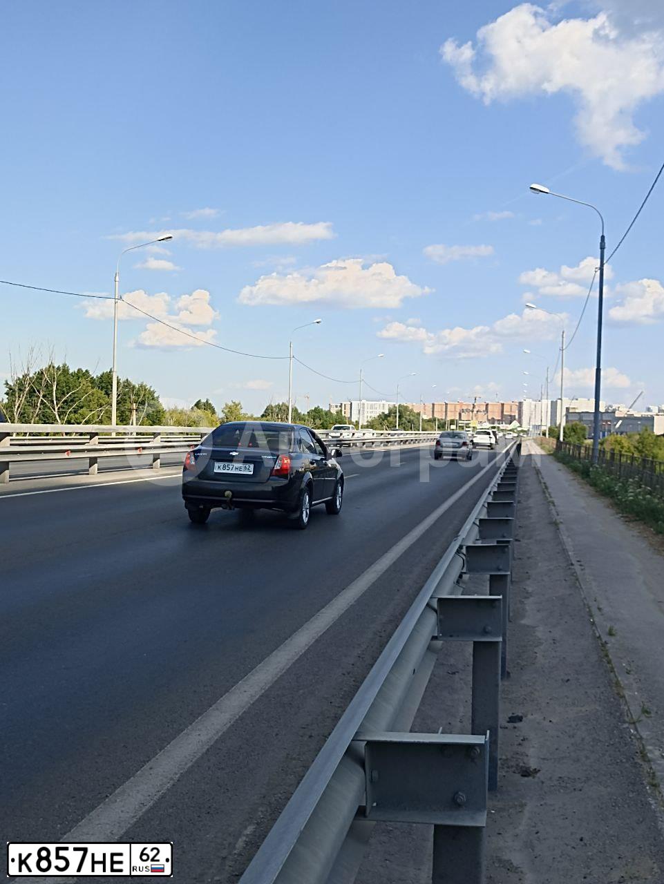 Фото автомобиля CHEVROLET LACETTI, 2007 — госномер К857НЕ62. Цвет: ЧЕРНЫЙ