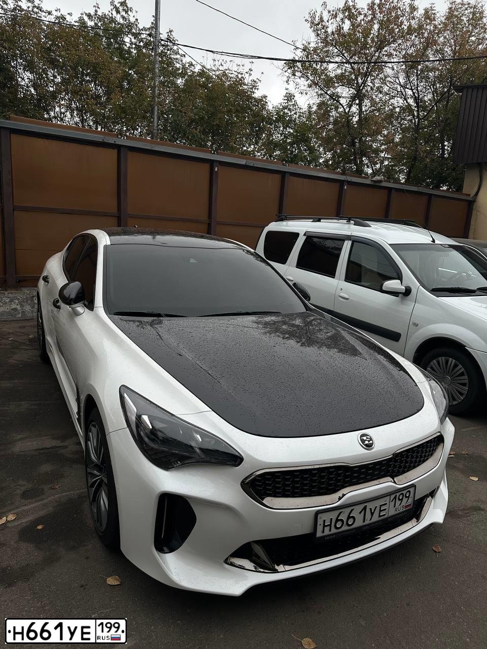 Фото автомобиля SSANGYONG KYRON, 2009 — госномер Н661УЕ199. Цвет: Серый