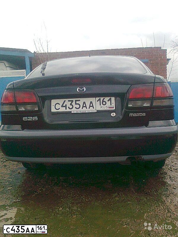 Фото автомобиля MAZDA 626, 1998 — госномер С435АА161. Цвет: ТЕМНО-ЗЕЛЕНЫЙ