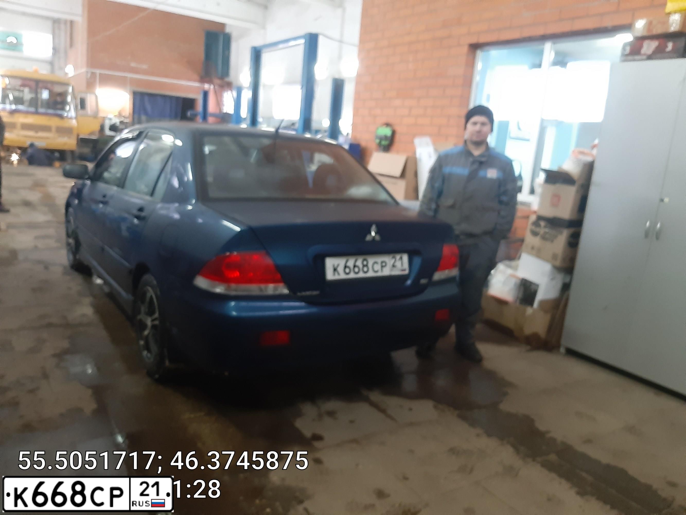 Фото автомобиля MITSUBISHI LANCER, 2005 — госномер К668СР21. Цвет: синий
