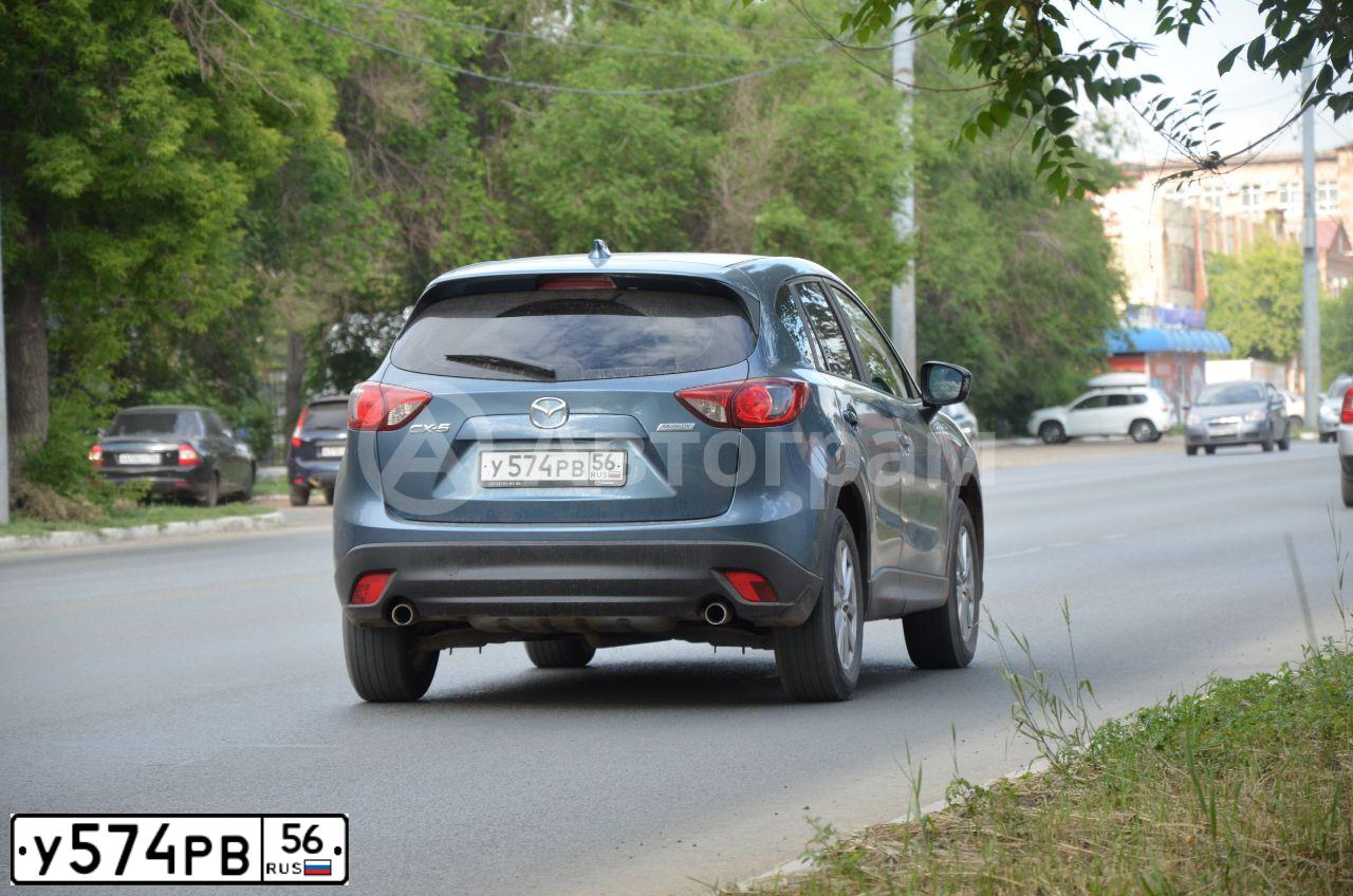 Фото автомобиля MAZDA CX-5, 2014 — госномер Х684ОТ174. Цвет: голубой