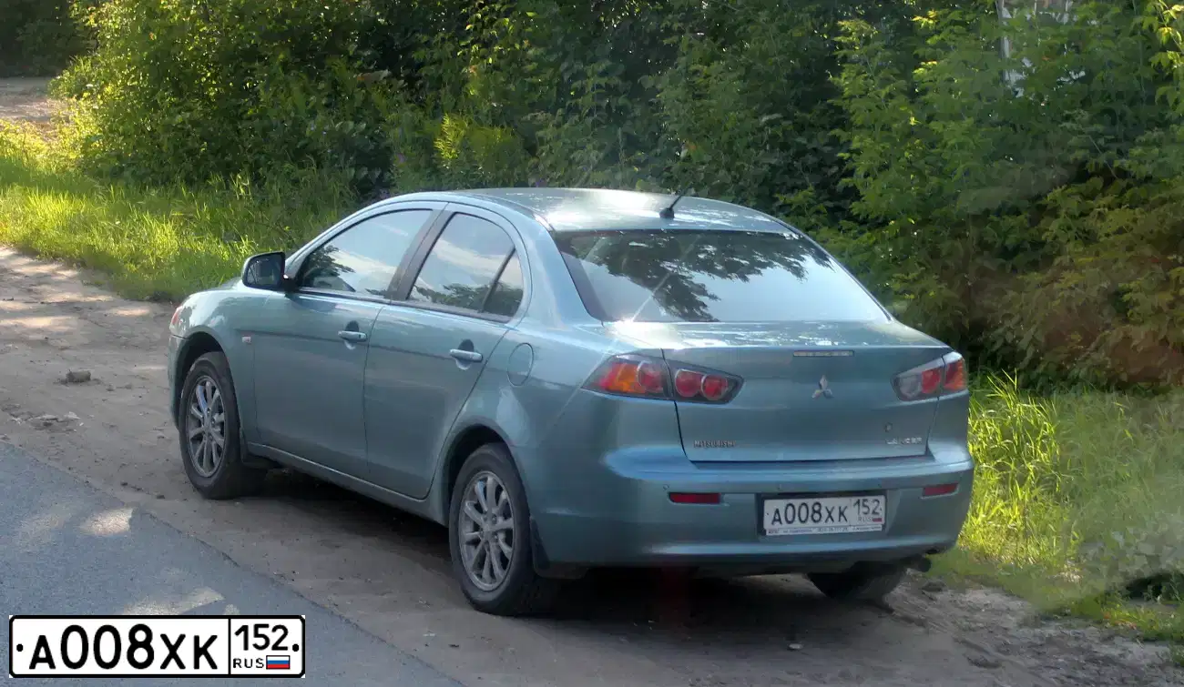 Фото автомобиля MITSUBISHI LANCER, 2010 — госномер А008ХК152. Цвет: СВЕТЛО-СЕРО-ЗЕЛЕНЫЙ