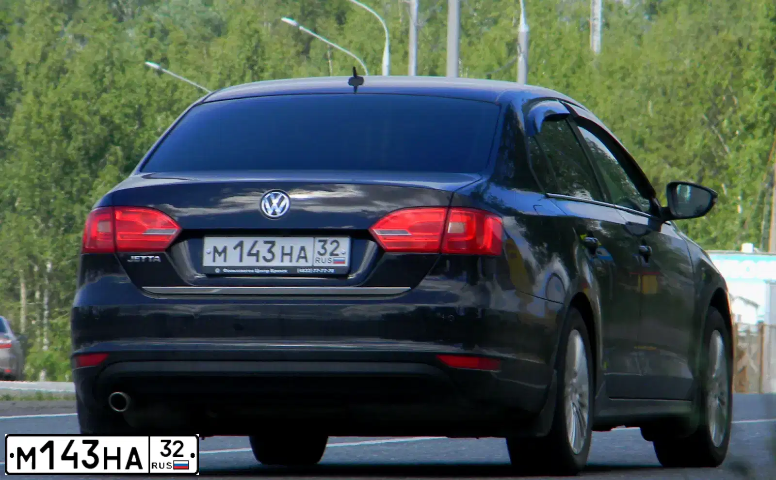 Фото автомобиля VOLKSWAGEN JETTA, 2012 — госномер М143НА32. Цвет: ЧЕРНЫЙ