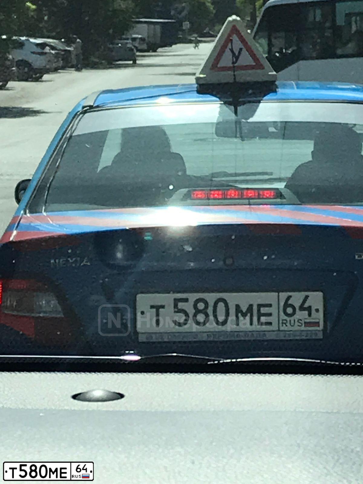Фото автомобиля DAEWOO O NEXIA, 2012 — госномер Т580МЕ64. Цвет: СИНЕ-ГЛАЗУРИСТЫЙ