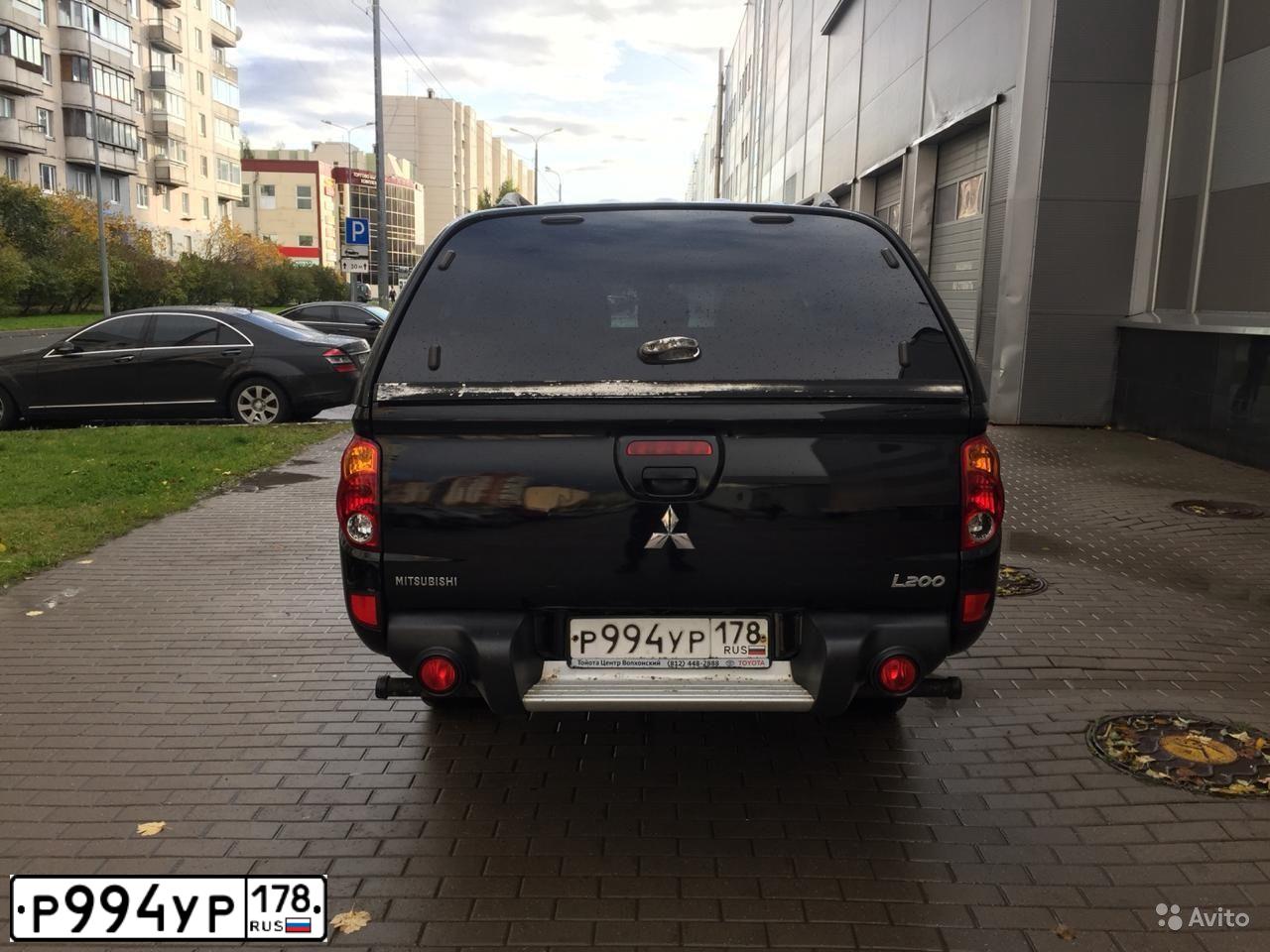 Фото автомобиля MITSUBISHI L 200, 2014 — госномер Р994УР178. Цвет: ЧЕРНЫЙ