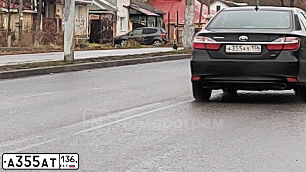 Фото автомобиля FORD FOCUS, 2011 — госномер О867УМ46. Цвет: СЕРО-КОРИЧНЕВЫЙ