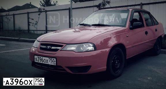 Фото автомобиля DAEWOO NEXIA, 2011 — госномер А004УО197. Цвет: ЯРКО-КРАСНЫЙ