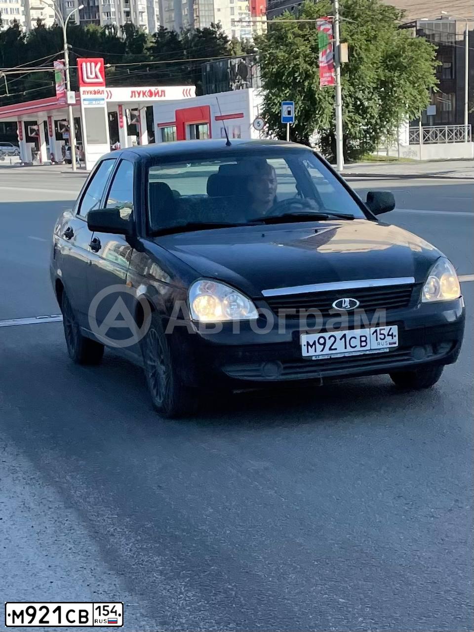 Фото автомобиля LADA 2170 PRIORA, 2011 — госномер А864ХС154. Цвет: СИНЕ-ЧЕРНЫЙ