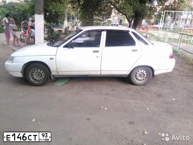 Фото автомобиля LADA 2110, 1999 — госномер Е302НЕ01. Цвет: ЯРКО-БЕЛЫЙ