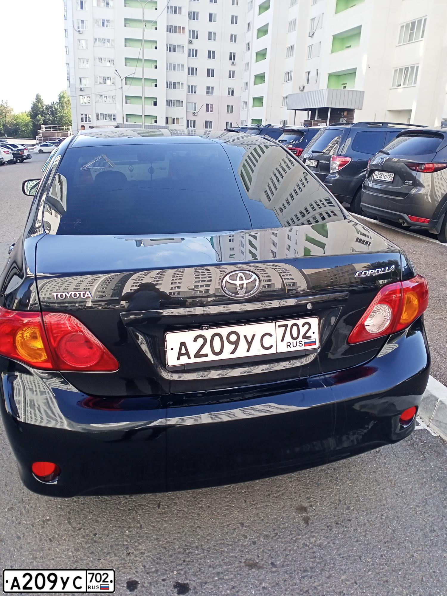 Фото автомобиля TOYOTA COROLLA, 2008 — госномер А209УС702. Цвет: ЧЕРНЫЙ