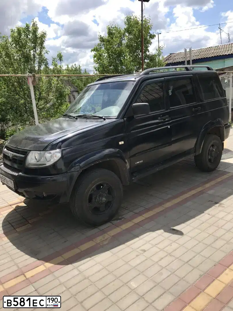 Фото автомобиля UAZ 3163 PATRIOT, 2007 — госномер Н408ЕМ774. Цвет: АВАНТЮРИН МЕТАЛЛИК